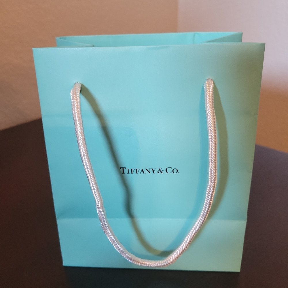 Authentic Tiffany & Co small Jewelry Bag. Asking $15